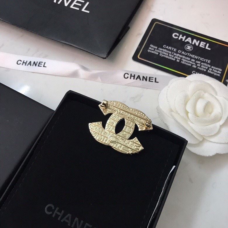 Ch**el brooches